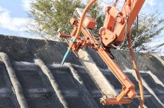 【大林組】法面上の鉄筋と型枠が不要に! ICT建機で吹付枠工の人員50%削減、工程25%短縮