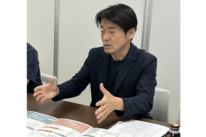 説明する永田さん