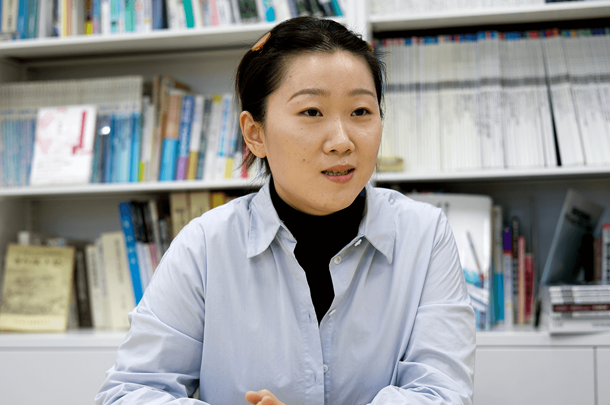 張さん